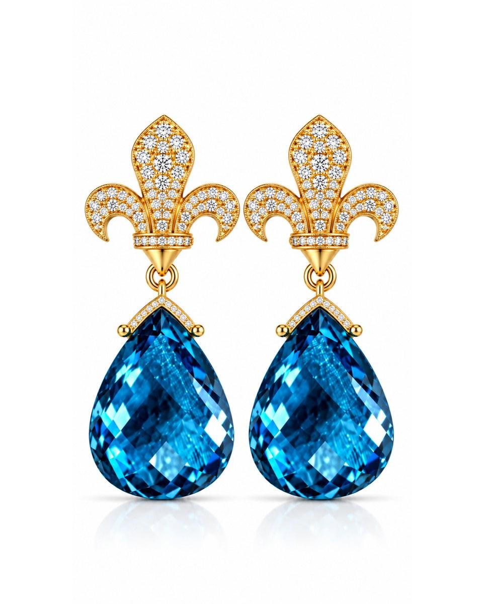 The Fleur Blue Diamond Cascade Earrings: two pear-shaped blue stones hanging from gold fleurs-de-lis set with small clear stones.