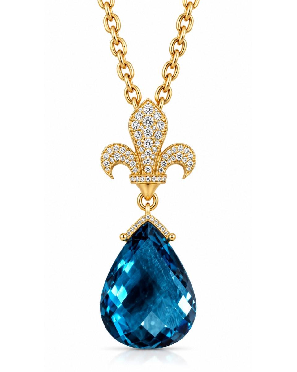 The Fleur Blue Diamond Cascade Necklace: a large pear-shaped blue stone hanging from a gold fleur-de-lis set with small clear stones, on a gold chain.