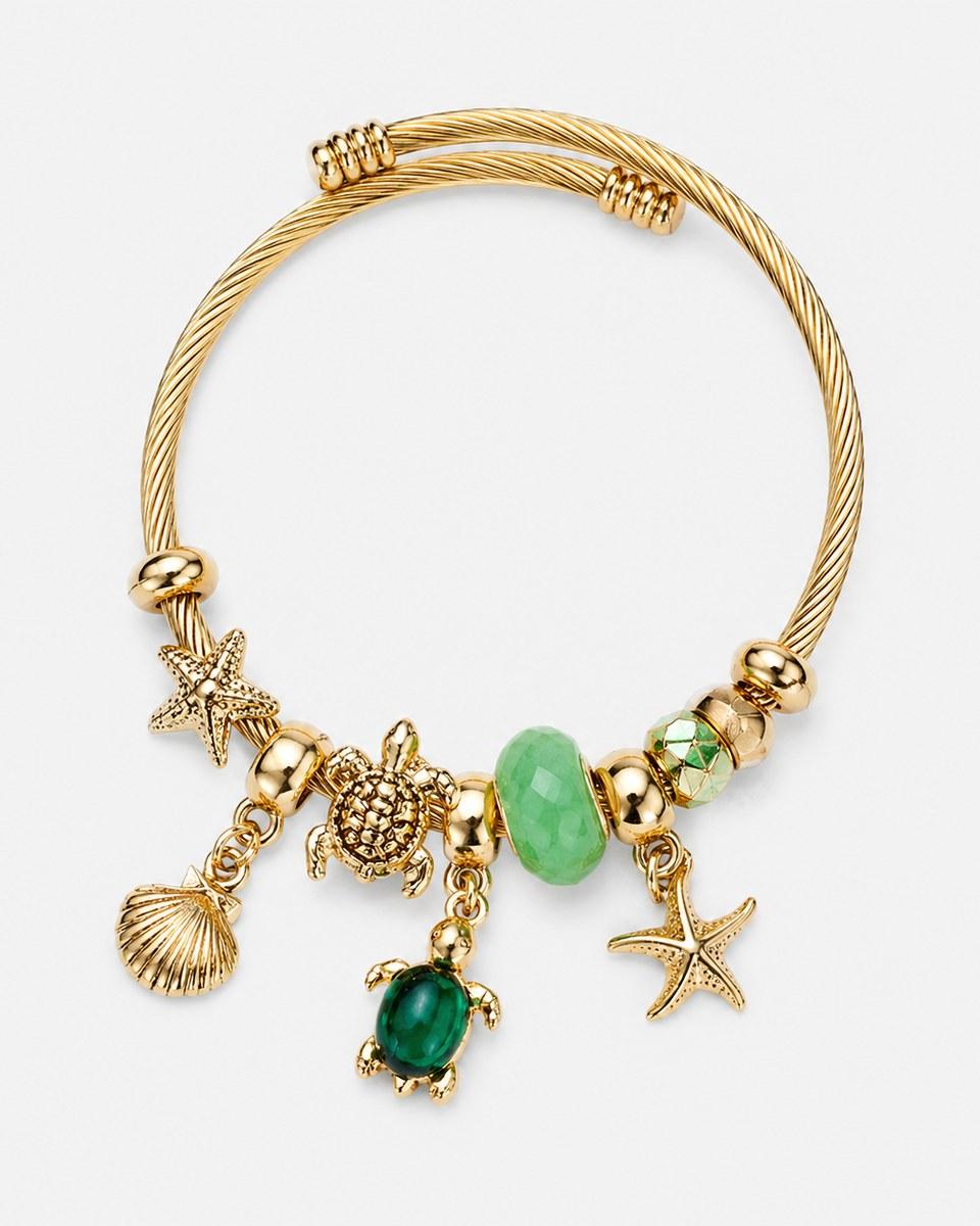 The Emerald Seaside Charm Bracelet: a gold-tone bangle hung with a shell, a starfish, a turtle and green beads.