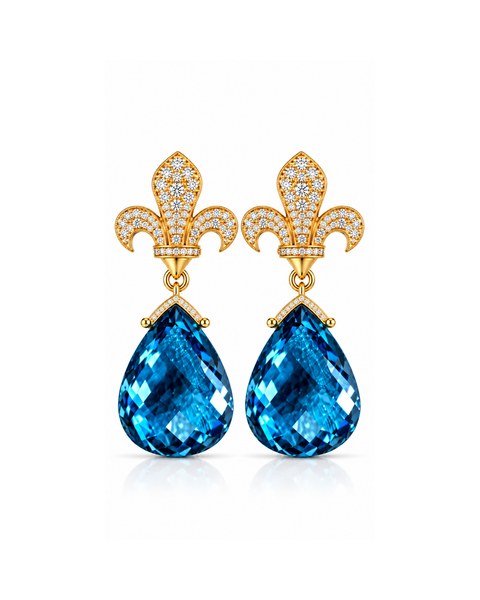 A pair of blue teardrop earrings beneath ornate fleur-inspired settings.
