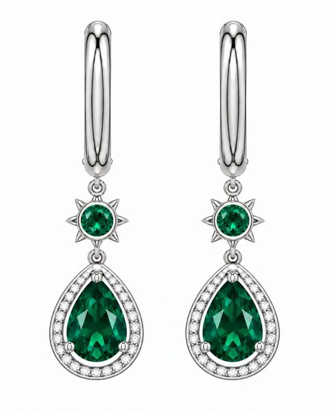 Green teardrop earrings with halos of clear stones beneath small sunburst settings.