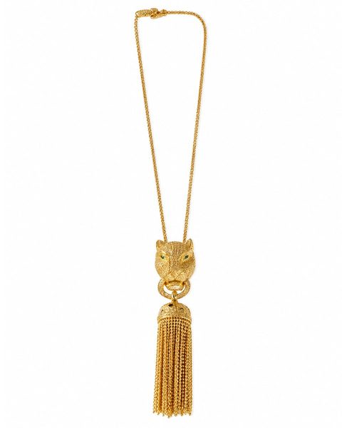 A long gold-tone chain with a sculpted panther head and cascading tassel.
